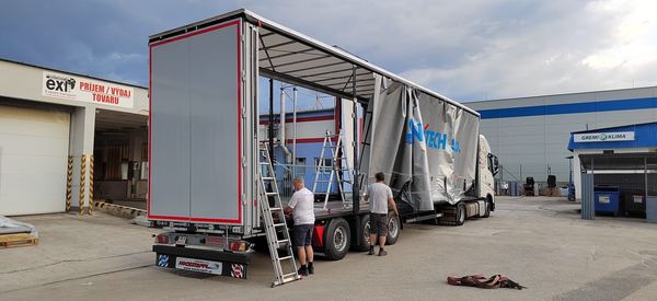 Trailer with the side curtain open